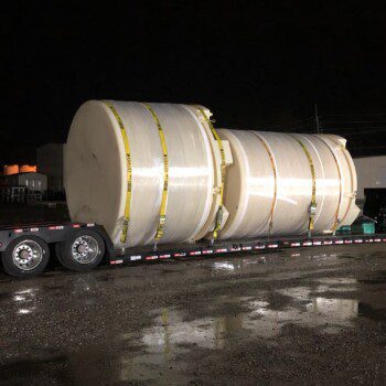 SAFE-Tanks on a lowboy trailer getting ready to head out