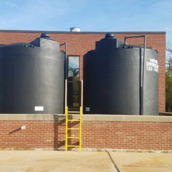 12,150 IMFO Tanks with F.S. 2650 Manway Covers Storing Sodium Hypochlorite